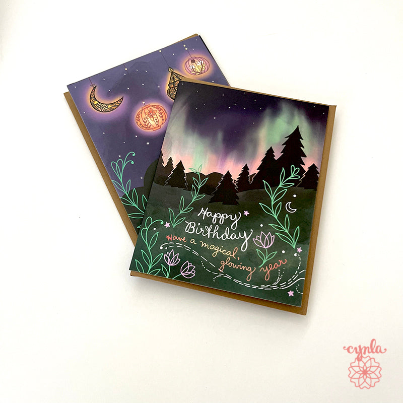 birthday cards with Northern Lights design and 'Happy Birthday' text. aurora greeting card magical nature art by Cynla - Cindy LaColla copyrighted art celestial designs